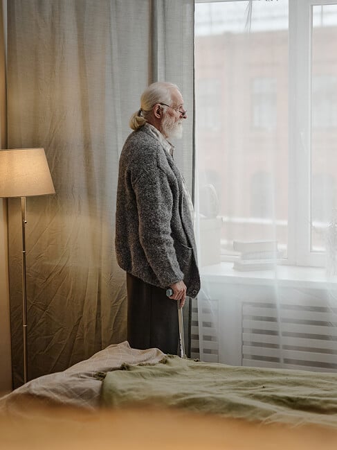 Elderly Man Smiling at Nursing Home in Oxford
